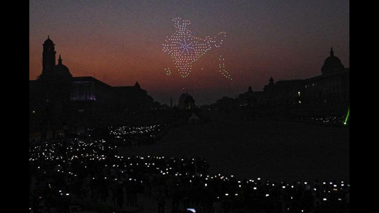 Drones with lights fly over the Presidential Palace during the full dress rehearsals for the upcoming `Beating Retreat` ceremony in New Delhi on January 27, 2022. Pic/AFP